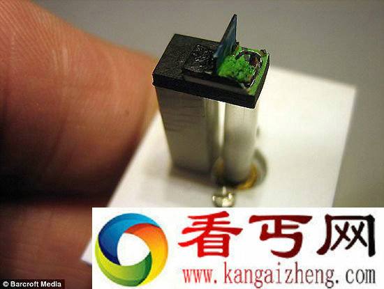 [图文]美火车迷造世界最小火车模型 比真实火车小35200倍
