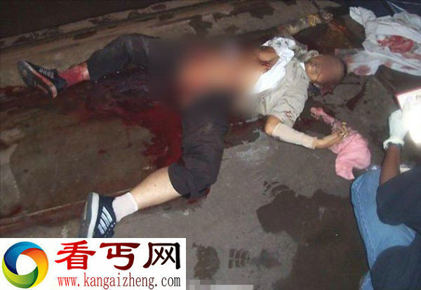 恐怖:妇女横过马路被机车勾穿腹部而亡
