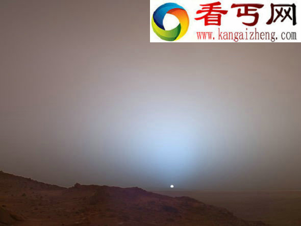 这是勇气号登上哈斯本德山,在山腰上远眺夕阳西下中的着陆地——古塞夫环形山 美国宇航局公布勇气号一张火星照